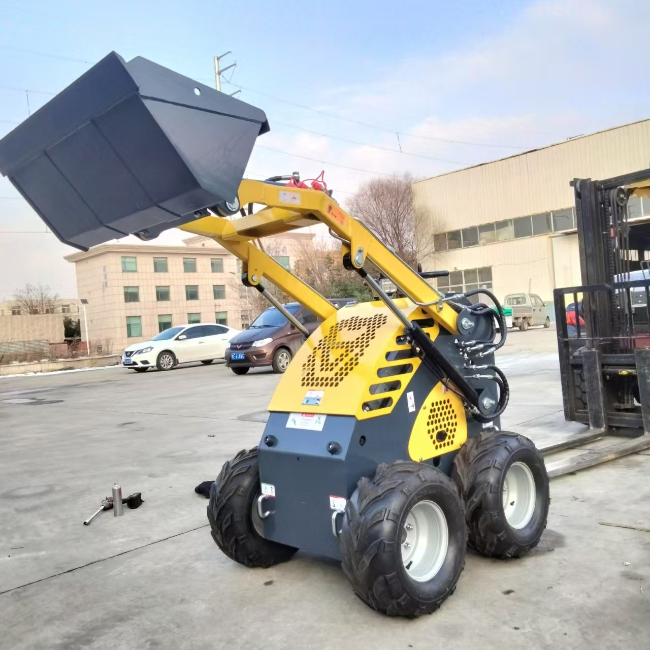 380E skid steer loader four-wh - Wheel Loader ulasan dan harga